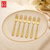 FnS Boston 6 Pcs Stainless Steel Gold Dessert Fork set with grooved handles, arranged on an elegant cream serving plate.