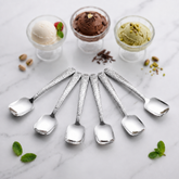 FnS Madrid 6-Pc hammered-finish stainless steel ice cream spoon set styled with chocolate, vanilla and pistachio scoops.