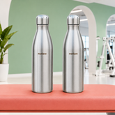 Montavo by FnS Bliss 750 ml stainless steel water bottle set of 2 with silver caps displayed on a coral gym bench