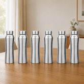 Montavo by FnS Oasis 750 ml stainless steel water bottle set of 6 with silver caps displayed on a wooden dining table