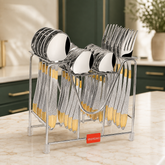 Montavo by FnS Passion 24-piece real gold-plated cutlery set with hanging stand on a marble table in a premium kitchen.