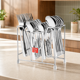 Montavo by FnS Trendz 24-piece cutlery set with steel stand on a beige countertop in a bright premium modern kitchen.