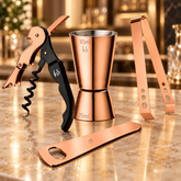 FnS 4 pcs Bar Tools Set in Rose Gold Finish on premium table.