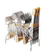 Complete stainless steel cutlery set with gold accents neatly arranged in a silver countertop stand.
