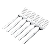Six silver dinner forks arranged diagonally showing sleek modern design and mirror finish