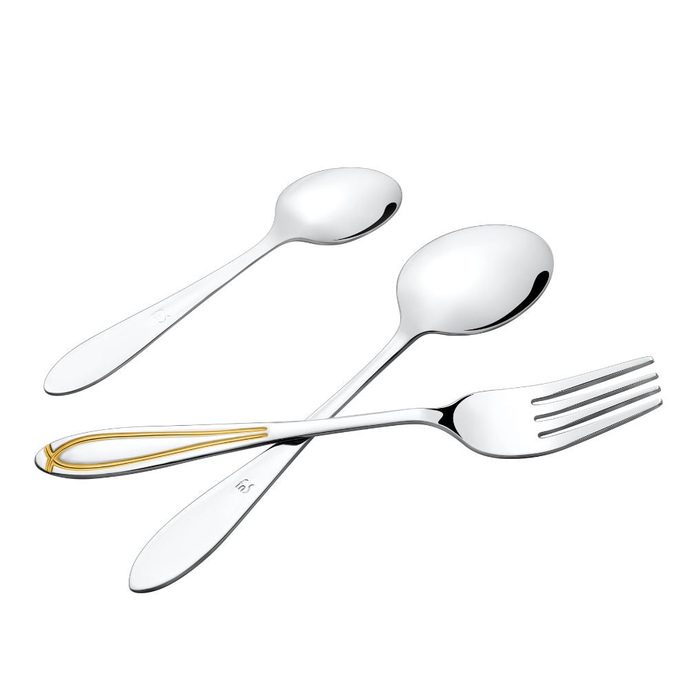 Three-piece silver cutlery set featuring one gold-accented handle, displayed on a plain white background.