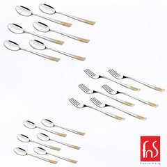 Complete silver cutlery set with gold chevron handles arranged flat with fns branding on white.