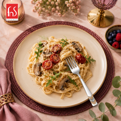FnS RAGA 24K gold plated stainless steel dinner fork served with creamy pasta in an elegant premium dining table setting