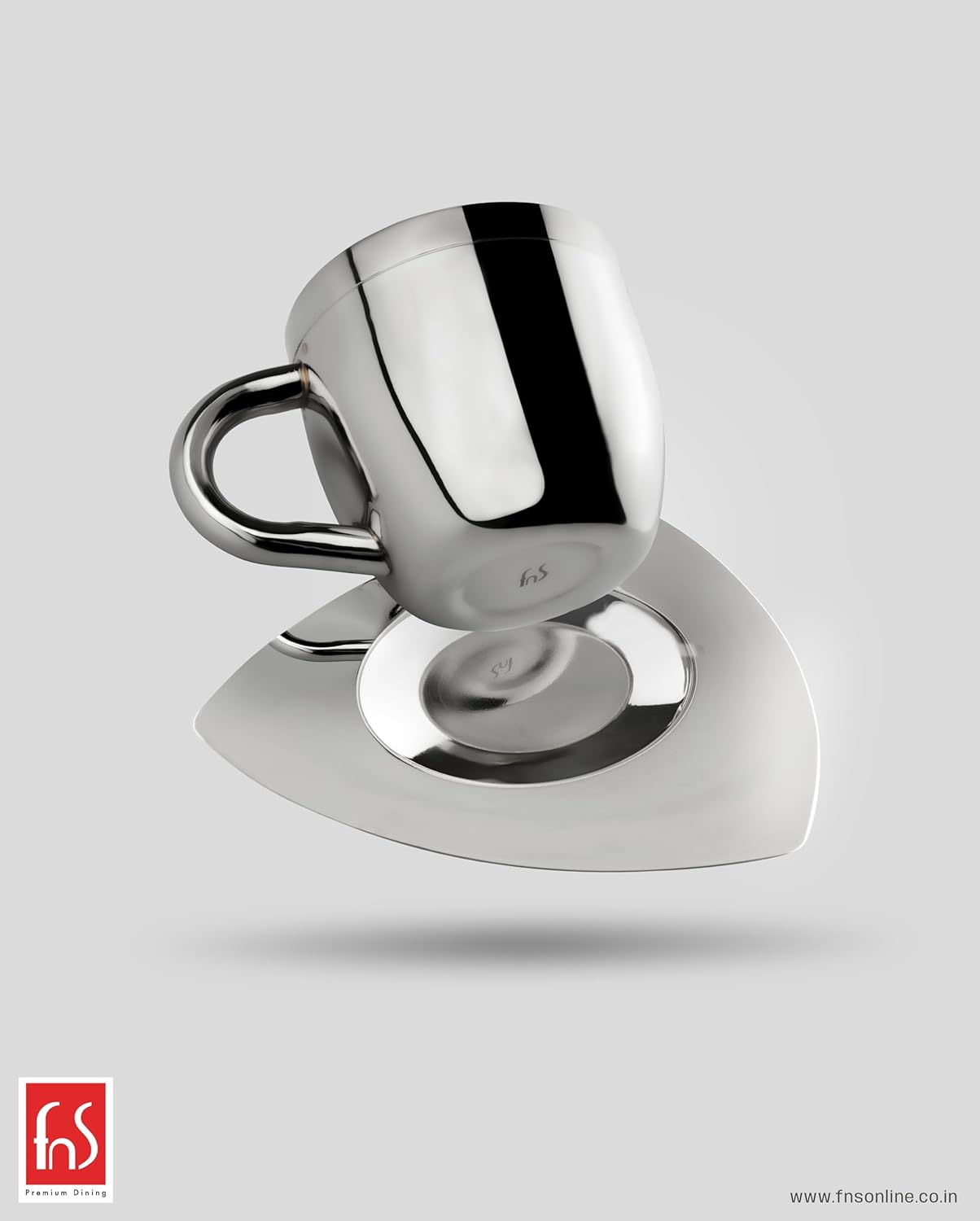 FnS Stainless Steel Tea Cup and Saucer Set with insulated double wall cup, glossy finish and modern designer saucer.
