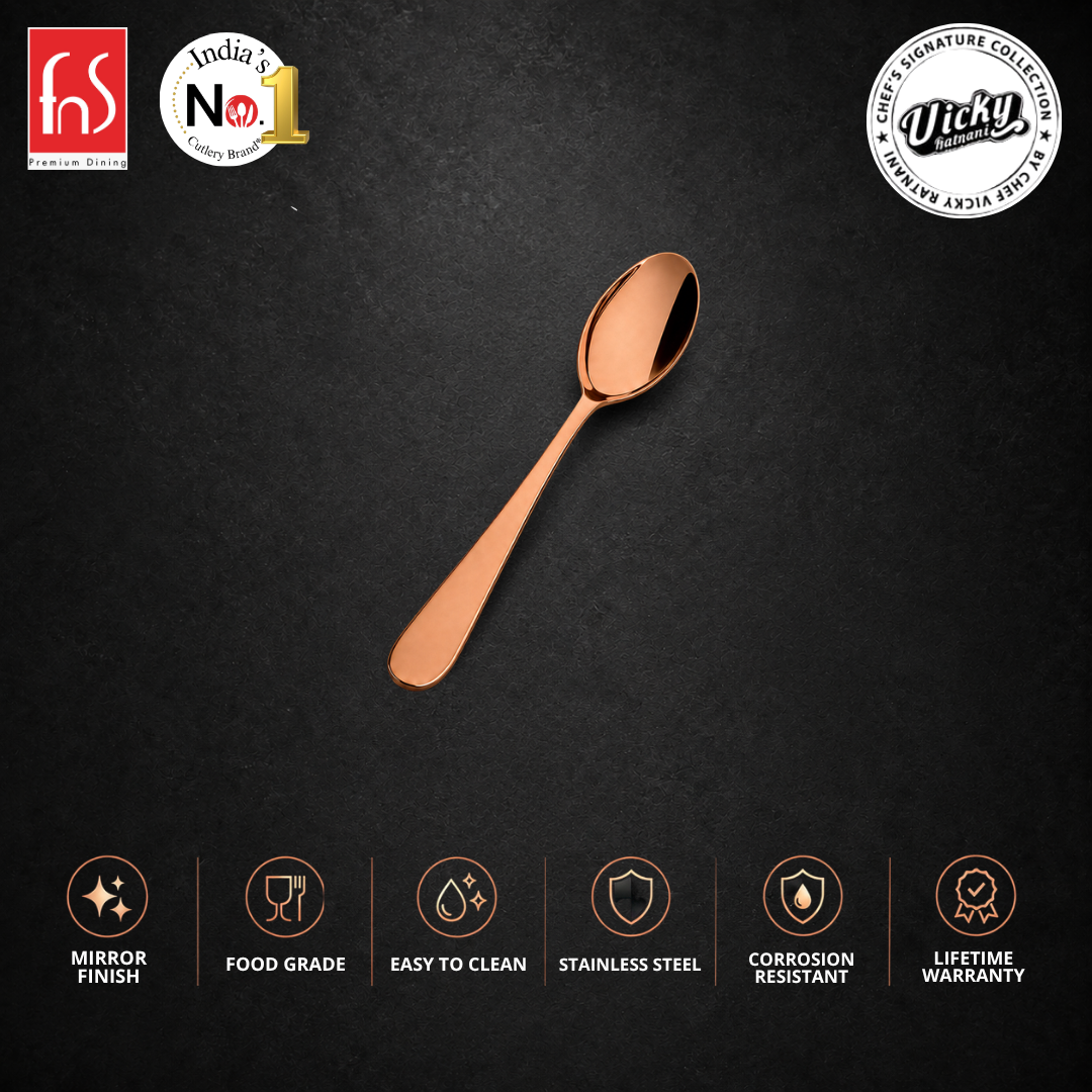 Livo rose gold stainless steel baby spoon with six product benefits displayed on a premium black background by FnS brand.