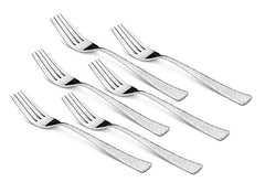 Six matching silver forks with patterned handles fanned out diagonally on white background.
