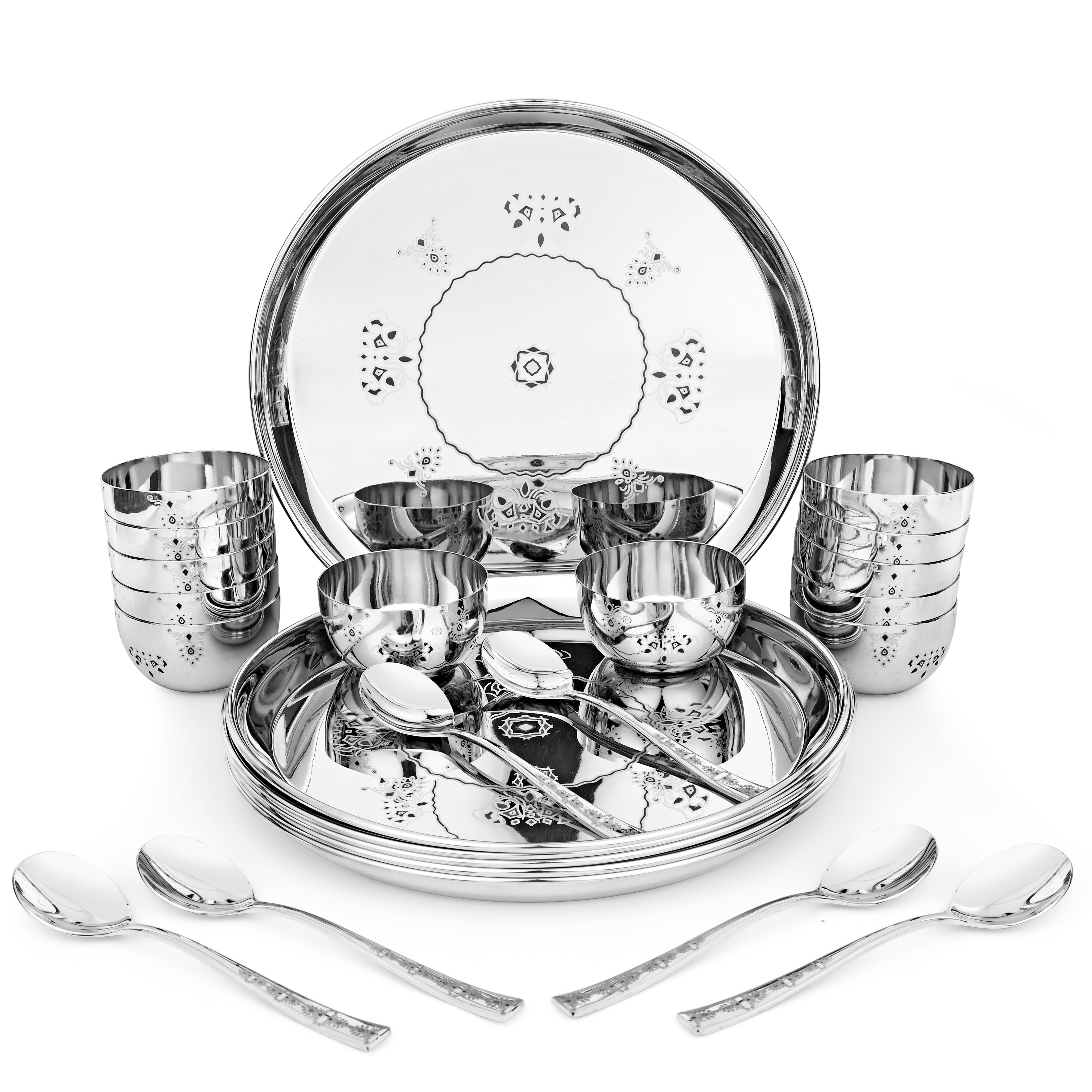 Complete stainless steel dinner set with decorated bowls, glasses, plates, and cutlery with ornamental pattern design