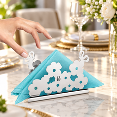 FnS Tulip Decorative Flower Stainless Steel Napkin Holder elegantly holds a blue napkin, adding charm to every dining table.
