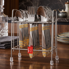 FnS Kenwood 18-piece 24-karat gold-plated cutlery set with decorative handles shown on a hanging stand on a wooden table.