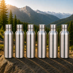Montavo by FnS Mist 1 litre stainless steel water bottle set of 6 with silver caps displayed on a scenic mountain trail