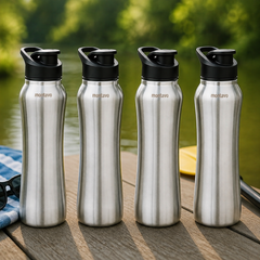 Montavo by FnS Reptide 1 litre stainless steel water bottle set of 4 with black caps displayed on a wooden table by a lake