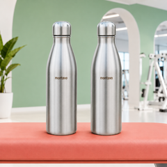 Montavo by FnS Bliss 750 ml stainless steel water bottle set of 2 with silver caps displayed on a coral gym bench
