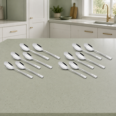 Montavo by FnS Creta 12-piece baby spoon set displayed on a pale sage kitchen counter in a clean bright premium setting.