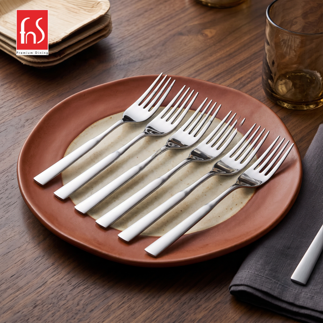 Montavo by FnS Lisbon stainless steel dinner fork set of 6 arranged on a premium plate with sleek mirror finish design