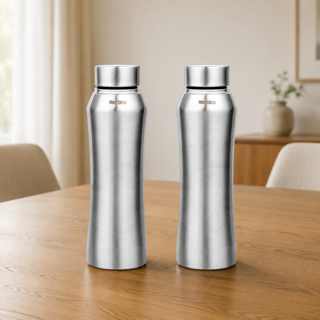 Montavo by FnS Oasis 750 ml stainless steel water bottle set of 2 with silver caps displayed on a wooden dining table