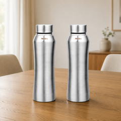 Montavo by FnS Oasis 750 ml stainless steel water bottle set of 2 with silver caps displayed on a wooden dining table