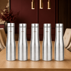 Montavo by FnS Purify 750 ml stainless steel water bottle set of 5 with silver finish displayed on a dining table
