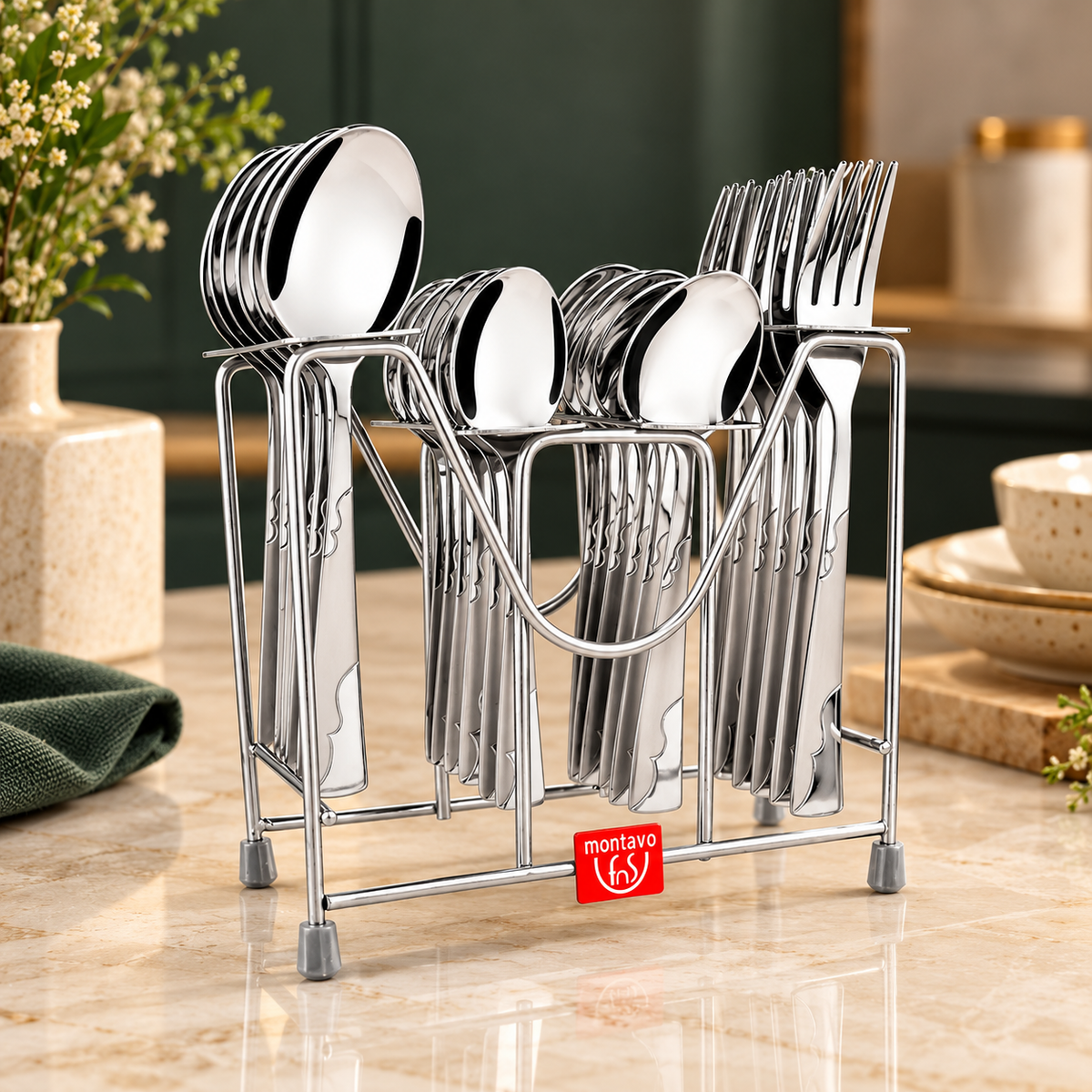 Montavo Creta 24-piece Stainless Steel Cutlery Set with Stand, featuring dinner spoons, forks, baby spoons and teaspoons in mirror finish.