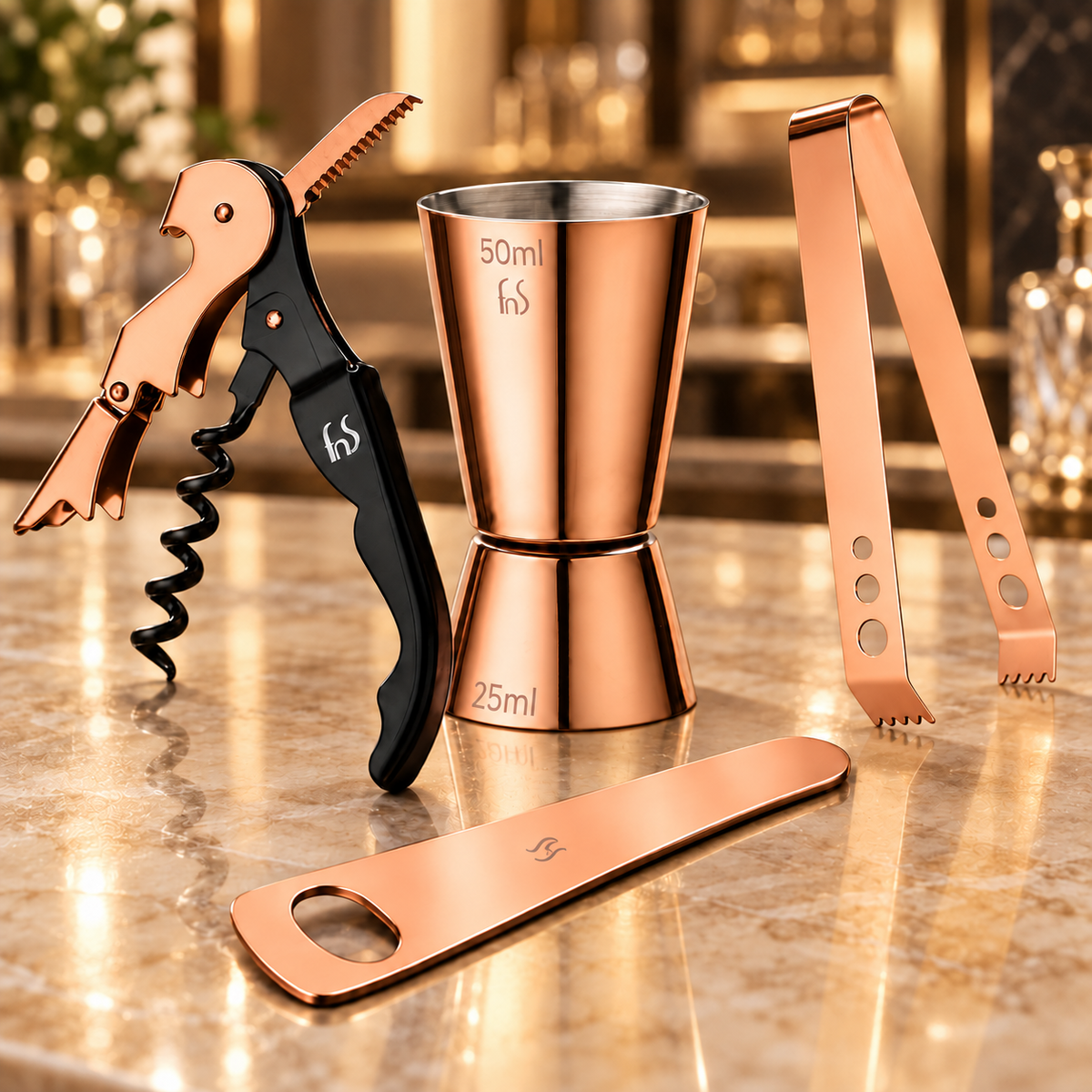 FnS 4 pcs Bar Tools Set in Rose Gold Finish on premium table.
