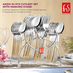 Anzio 24-piece gold-plated cutlery set on hanging stand, arranged on elegant dining table setup.