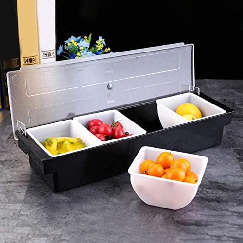 Bar condiment caddy with clear lid opened, displaying four compartments with colorful fruit garnishes including peppers, tomatoes, and lemons with extra bowl beside