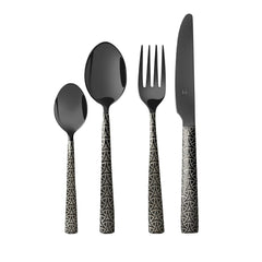 Four-piece matte black cutlery set with symmetrical geometric pattern, neatly aligned on a white background.