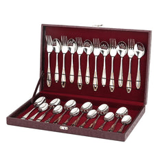 Complete silverware set with gold-trimmed handles arranged in a maroon velvet-lined storage box, displayed open.