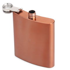 Copper hip flask with cap removed showing threaded copper opening and interior construction detail