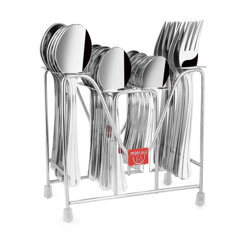 Polished silver cutlery set neatly arranged in a chrome holder with red Montalvo label, isolated.