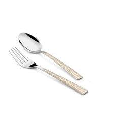 Stylish fork and spoon set with textured ivory handles displayed diagonally on a white background.