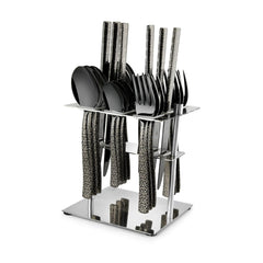 Complete black cutlery set with textured geometric handles organized neatly in silver metal countertop holder.