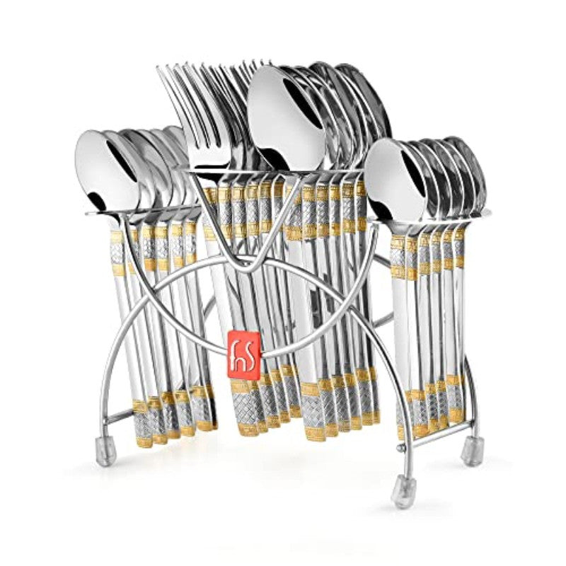 Complete stainless steel cutlery set with golden accents neatly arranged in a chrome stand for display.