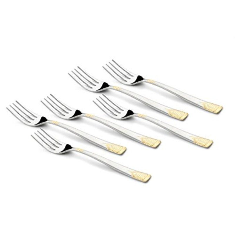 Six August Dinner Forks with sleek stainless steel design and 24K gold detailing at the handle ends are laid out in a neat diagonal pattern.