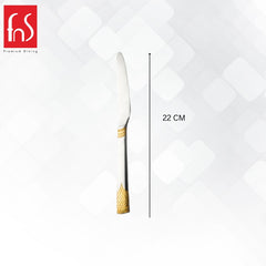 Single August dinner knife measuring 22cm in length with gold textured bands on handle, displayed on white geometric background with FnS branding.