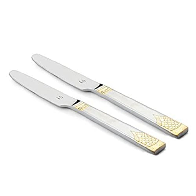 Two stainless steel dinner knives with elegant gold textured accent bands on handles, displayed diagonally on clean white background for flatware collection.