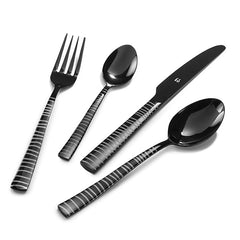 Four-piece black stainless steel cutlery set with silver stripes, displayed on a white background.