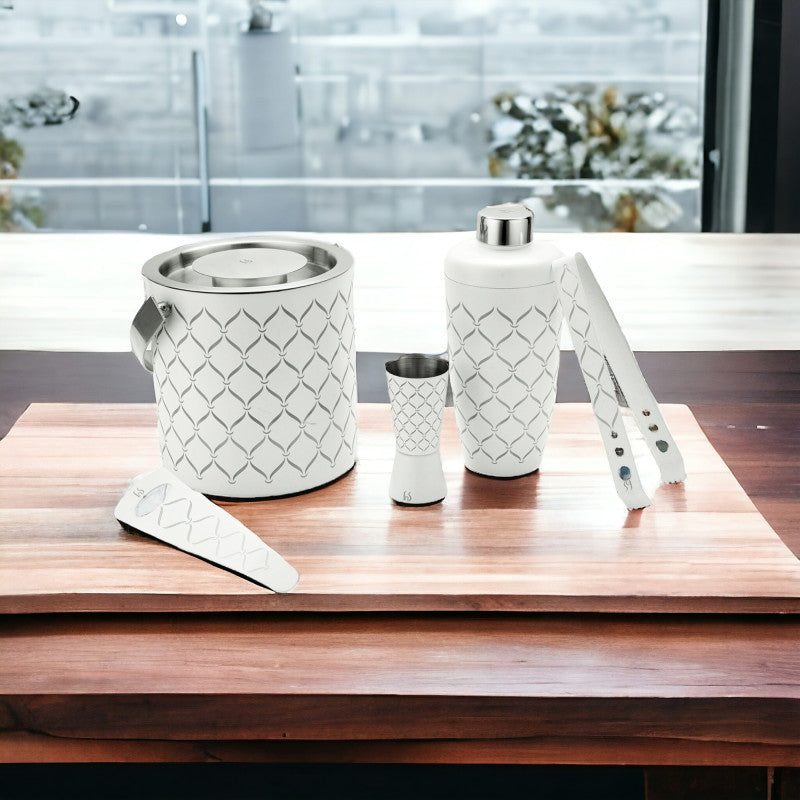 FNS 5-piece white bar tool set arranged on wooden serving board in modern home setting