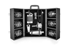 FNS Cheers Cabinet stainless steel bar tools and crystal glasses arranged on dark countertop with cocktails