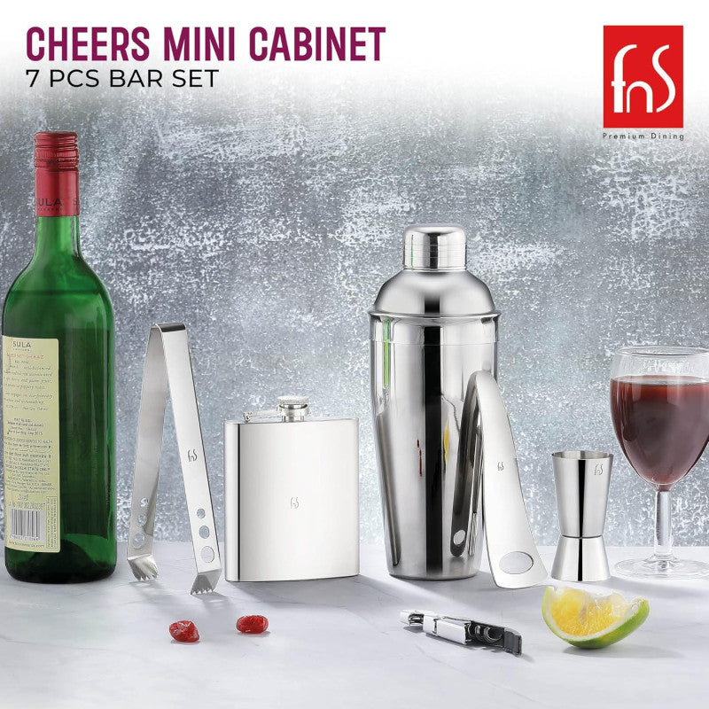 FNS Cheers Mini Cabinet bar set lifestyle shot with wine bottle, cocktail shaker, flask, and mixed drink on counter