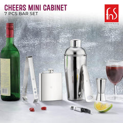 FNS Cheers Mini Cabinet bar set lifestyle shot with wine bottle, cocktail shaker, flask, and mixed drink on counter