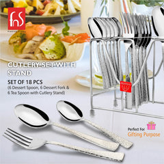 Cutlery set and individual pieces displayed near plated meal, emphasizing premium look and gifting purpose.