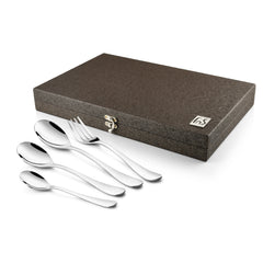 Brown textured cutlery case with silver fork and spoons arranged neatly outside on white background.