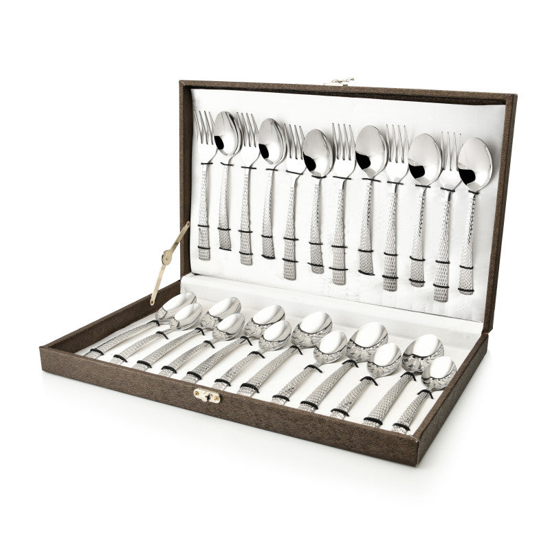 Elegant stainless steel cutlery set with textured handles neatly arranged inside a premium presentation gift box.