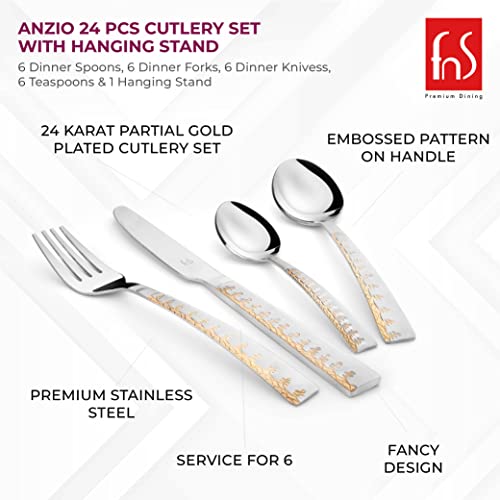 Close-up of knife, fork, and spoons showing 24K gold plating, stainless steel, and decorative embossed pattern.