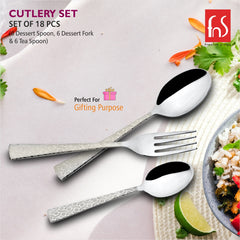 Three patterned-handle utensils from FNS cutlery set displayed with food, highlighting gifting purpose.